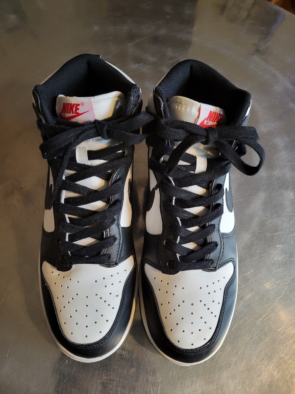 Nike Men’s Black & White Mid-Top Sneakers with Red Logo